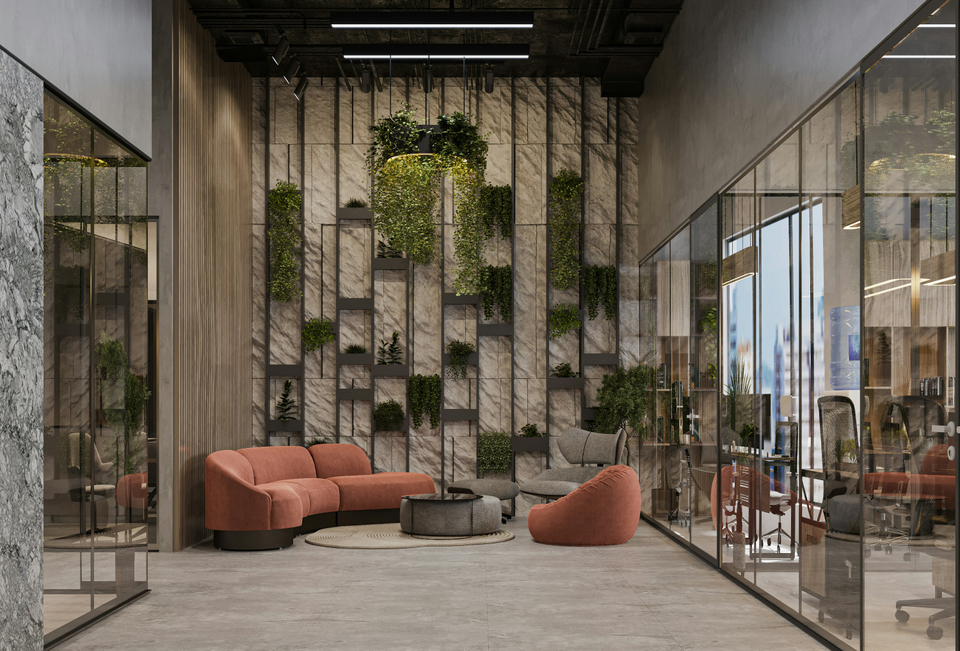 Double-height office lobby with hanging plants and lounge seating